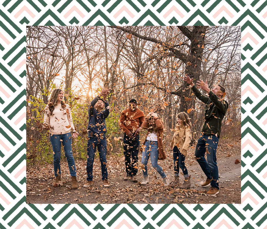 Folks at Myna therapy laughing and throwing autumn leaves